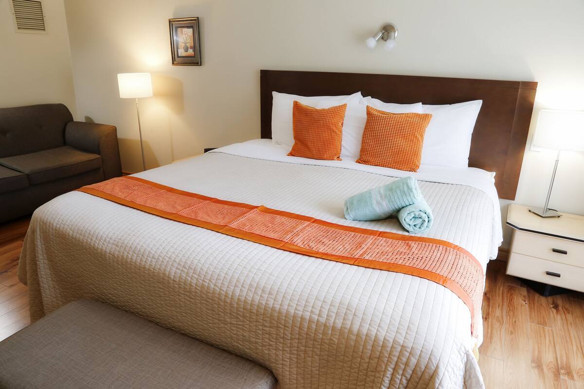 Classic Room, 1 Queen Bed, Single Whirlpool Tub, Balcony | Premium bedding, blackout curtains, soundproofing, free WiFi
