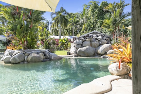 Outdoor pool, open 8:00 AM to 8:00 PM, sun loungers