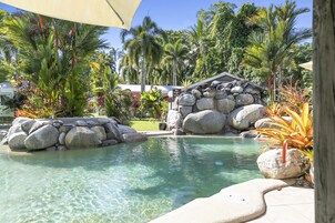 Outdoor pool, open 8:00 AM to 8:00 PM, pool loungers