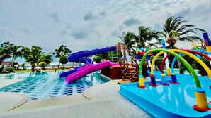 A water park with multiple slides and play structures. - De Baron Resort (Langkawi)