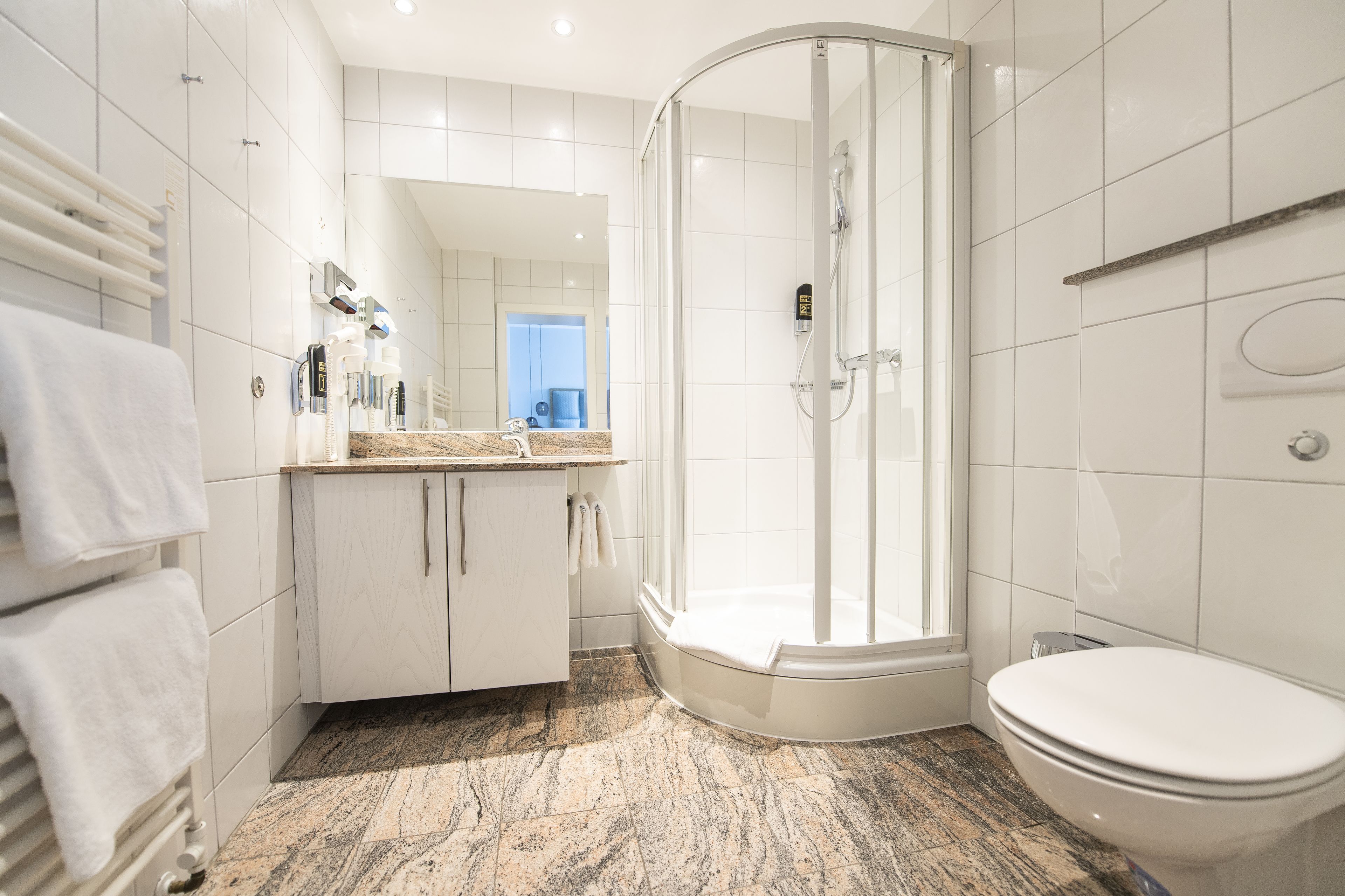 standard triple room | bathroom | separate bathtub and shower, free toiletries, hair dryer, towels