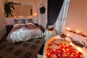 Junior Suite, 1 Queen Bed, Hot Tub, City View | Down duvets, individually furnished, blackout curtains, rollaway beds