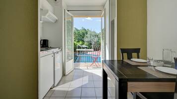 Comfort Studio, Balcony | Living area | TV, table tennis