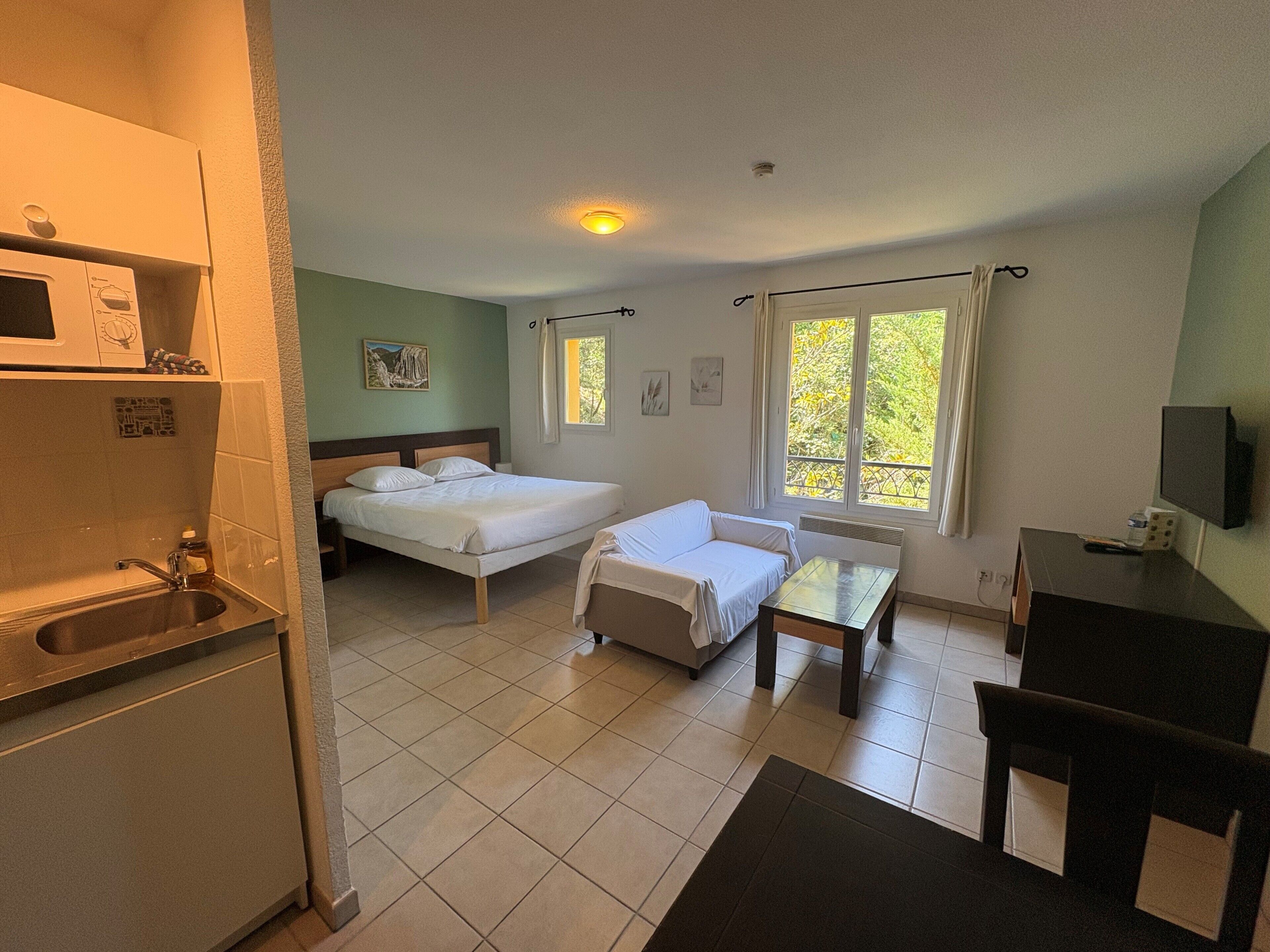 Comfort-studiolejlighed | Opholdsområde | Tv, bordtennisbord
