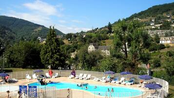 Indoor pool, outdoor pool, pool umbrellas, pool loungers