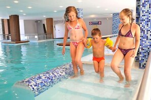 Indoor pool, outdoor pool, pool umbrellas, pool loungers