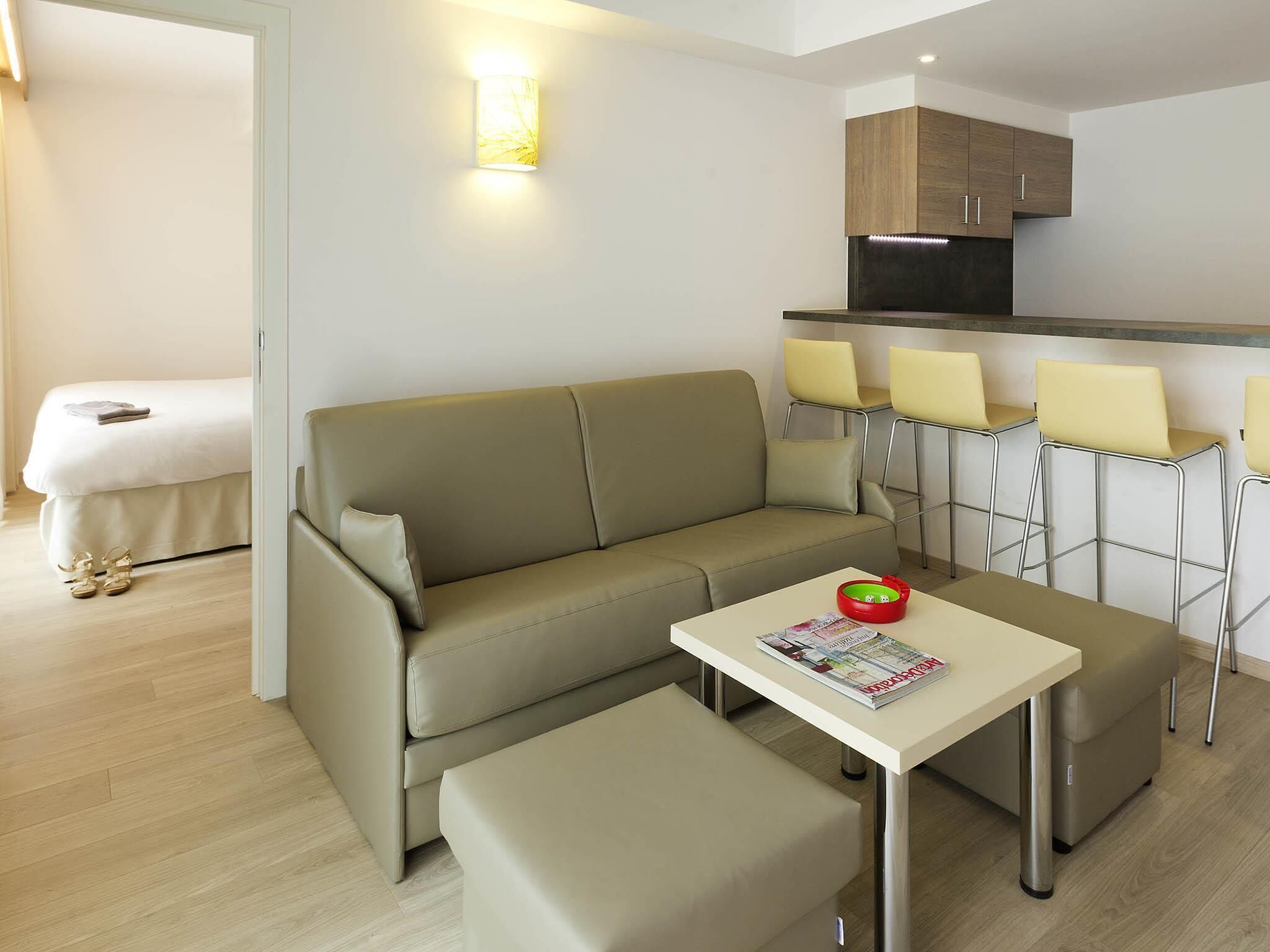 family suite, 2 bedrooms | in-room safe, desk, laptop workspace, blackout curtains