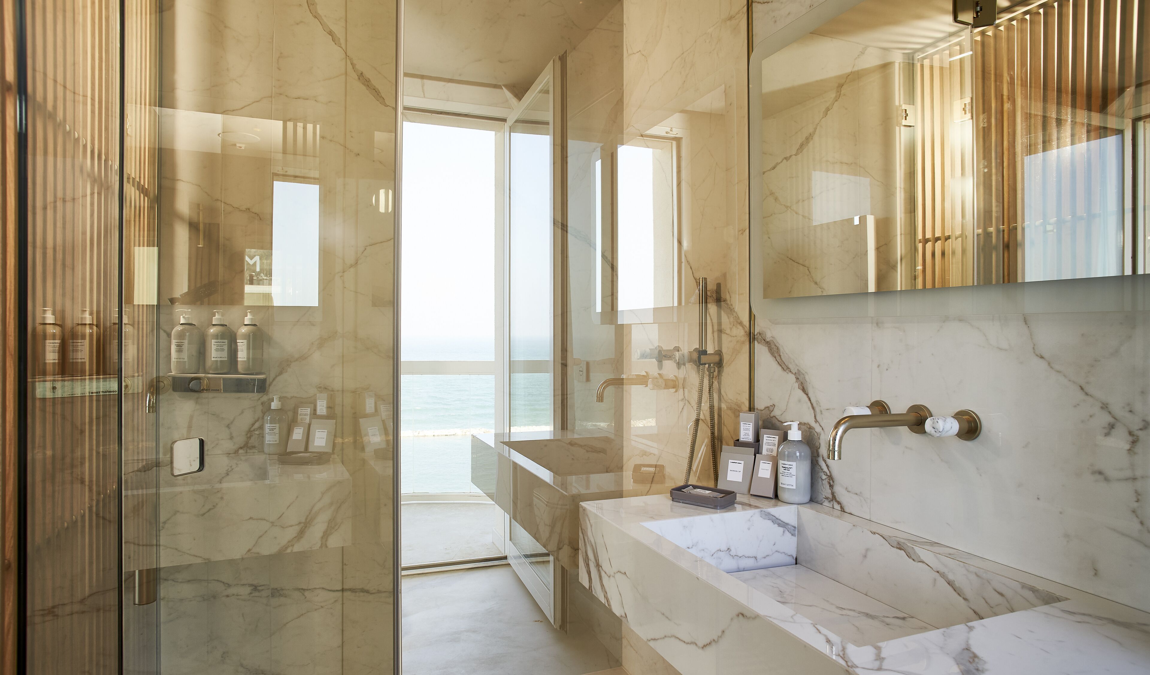 junior studio suite, multiple beds, sea view (levante) | bathroom | rainfall showerhead, hair dryer, slippers, bidet