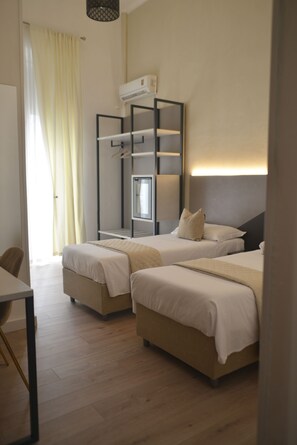 Chambre Confort Double ou avec lits jumeaux, salle de bains privée