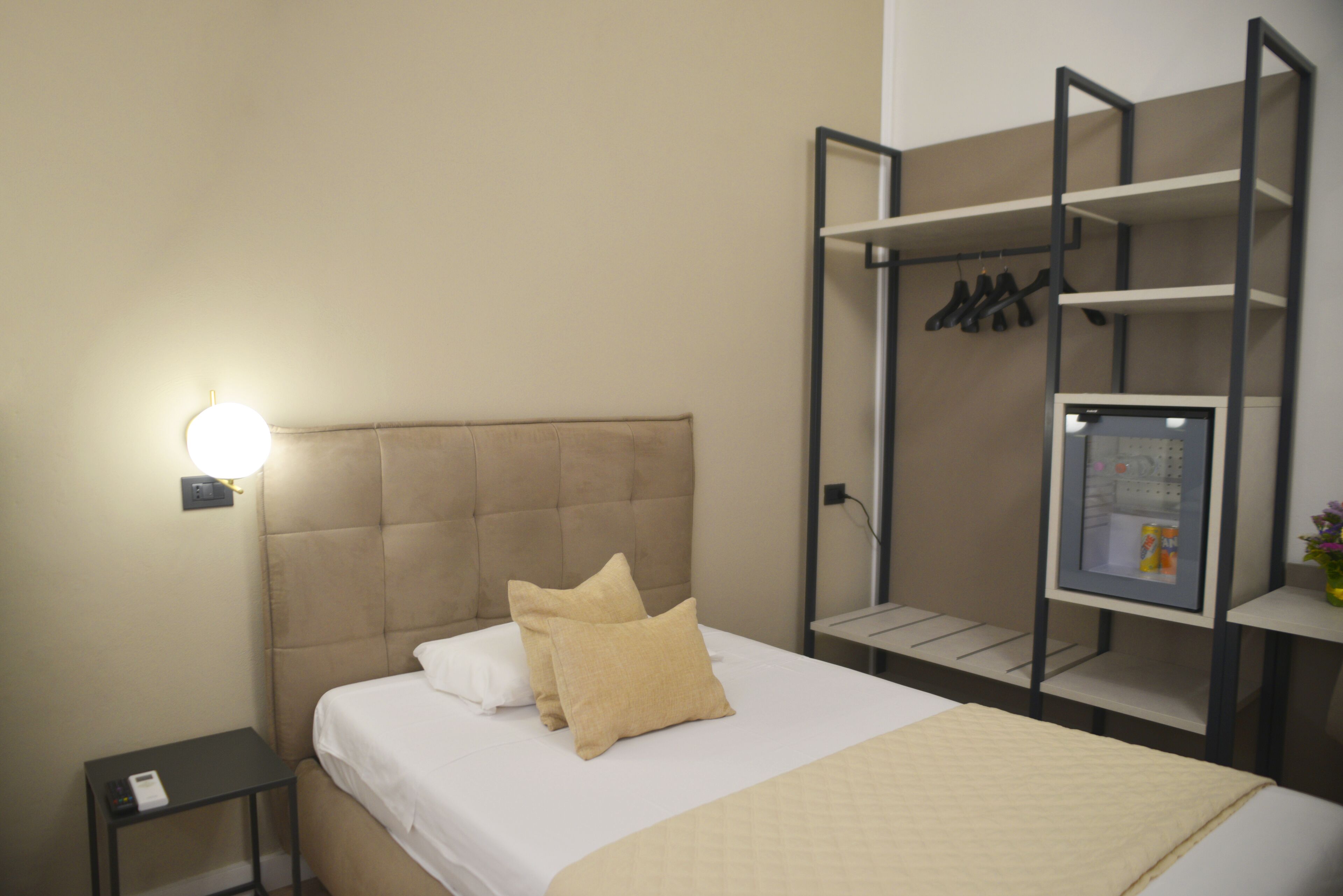 classic single room, 1 large single bed, non smoking, private bathroom | minibar, in-room safe, desk, free wifi