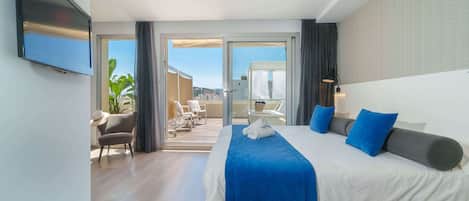 Suite, terrasse | Minibar, coffres-forts dans les chambres, bureau, chambres insonorisées