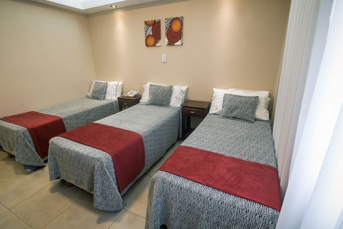 standard triple room | in-room safe, desk, free wifi, bed sheets