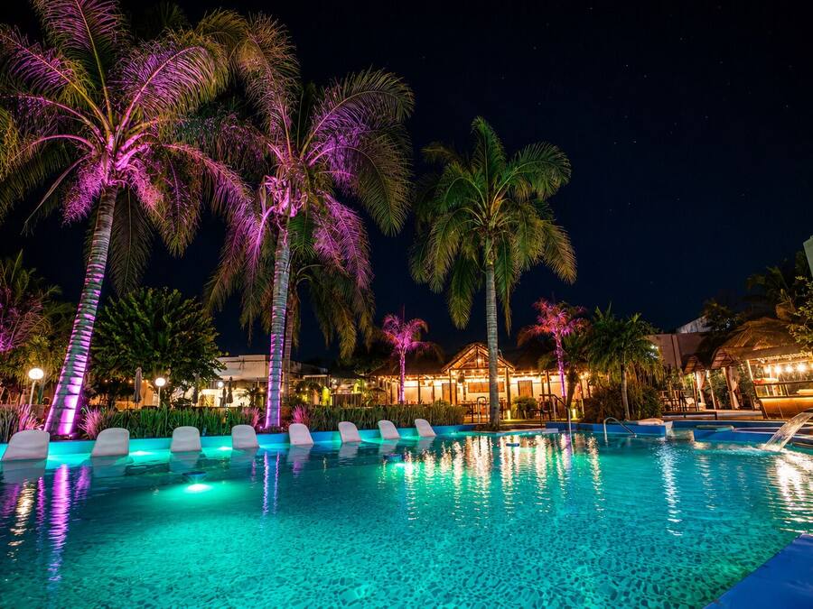 Outdoor pool, open 9:00 AM to midnight, pool umbrellas, pool loungers