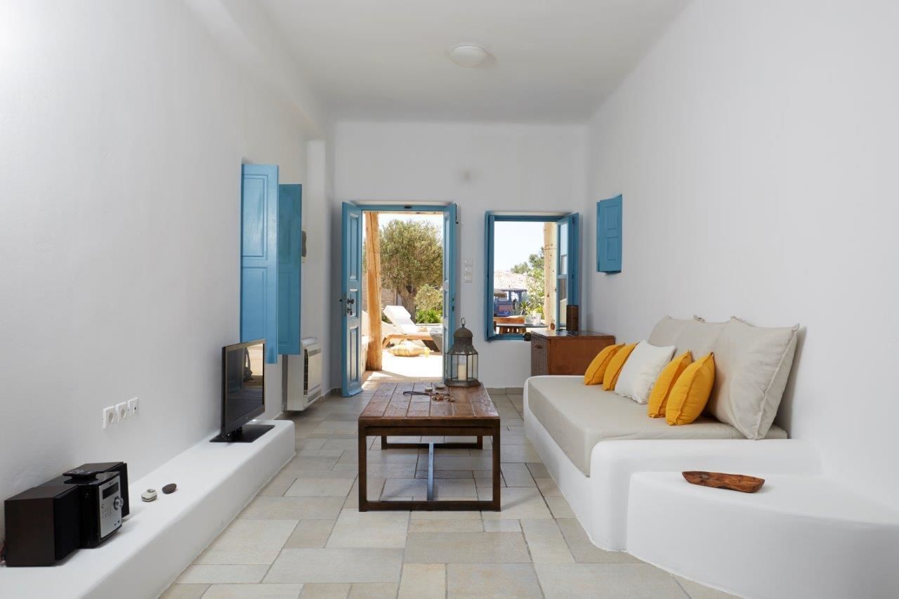 superior suite | living area | 32-inch lcd tv with satellite channels, tv, dvd player