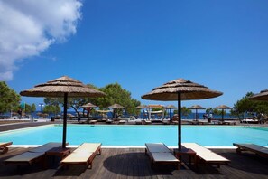 Outdoor pool, pool umbrellas, pool loungers