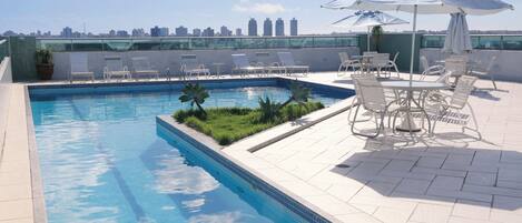Outdoor pool, pool umbrellas, sun loungers