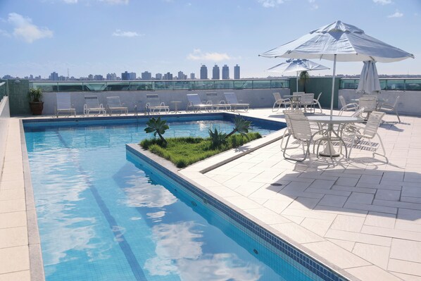Outdoor pool, pool umbrellas, sun loungers