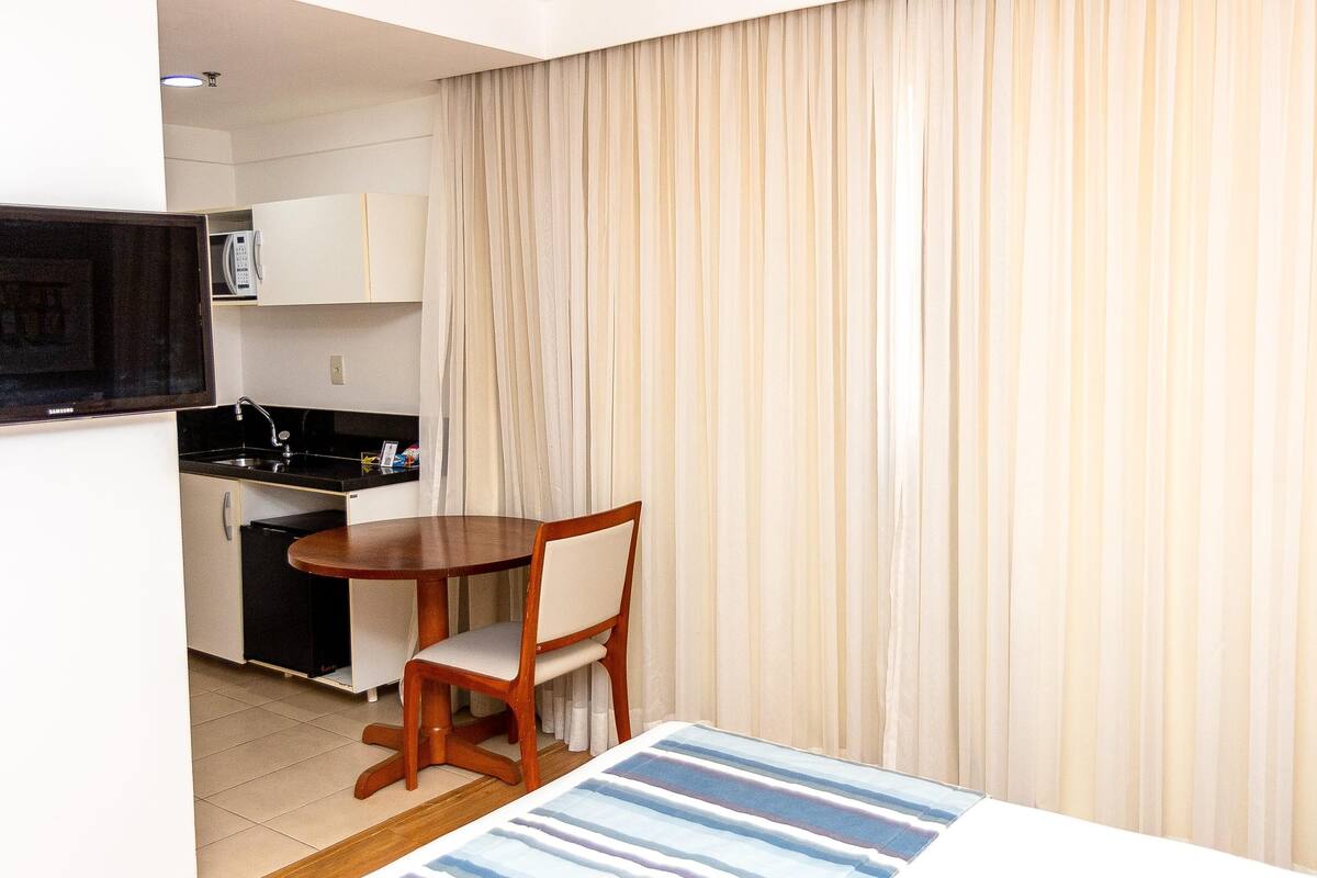 Desk, blackout curtains, soundproofing, free WiFi