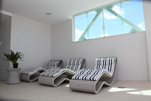 Outdoor pool, open 6:00 AM to 10:00 PM, pool umbrellas, sun loungers