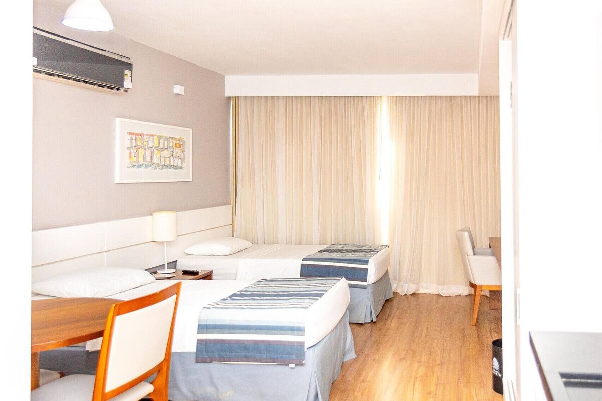 Desk, blackout curtains, soundproofing, free WiFi