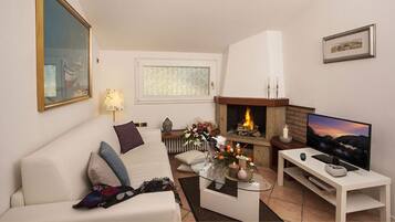 Junior Suite | Living area | 28-inch LED TV with digital channels, TV