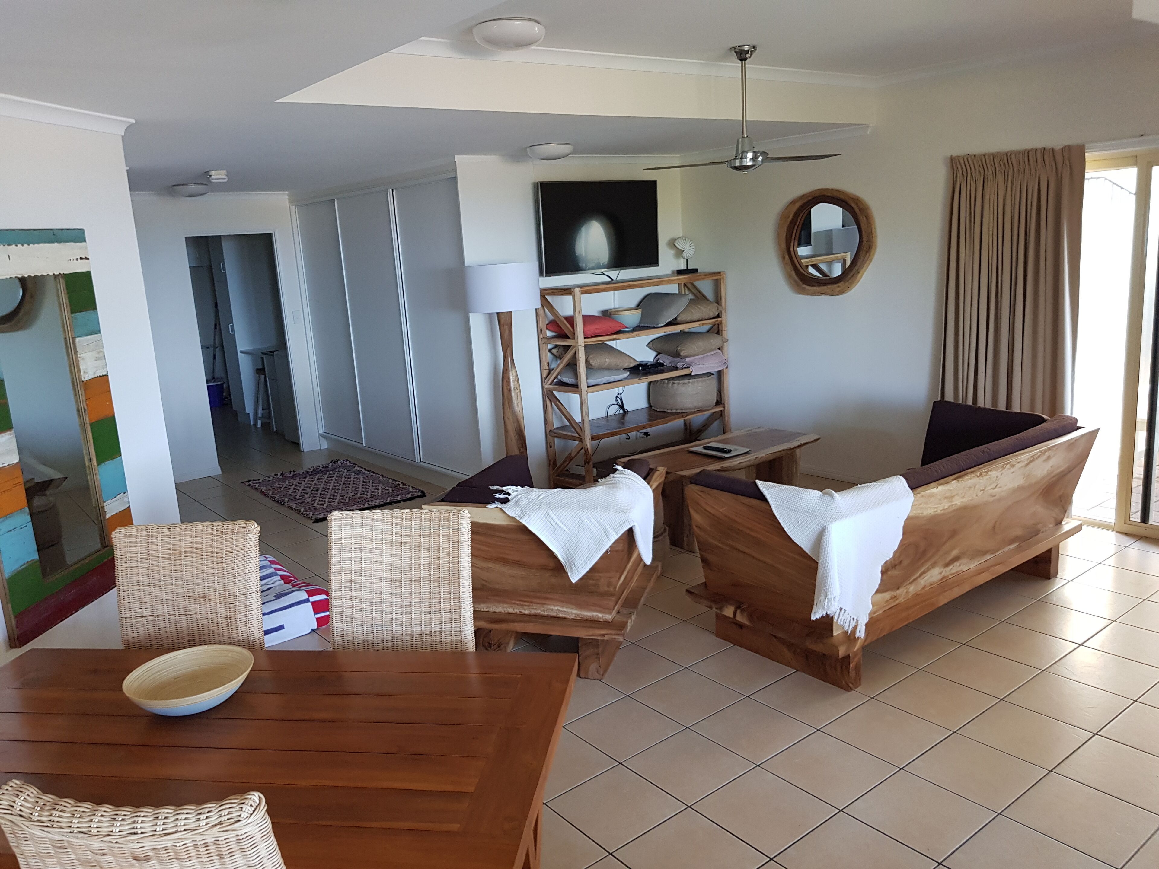 pet friendly - two bedroom beachfront apartment with yard | living area | 32-inch lcd tv with digital channels, tv, dvd player