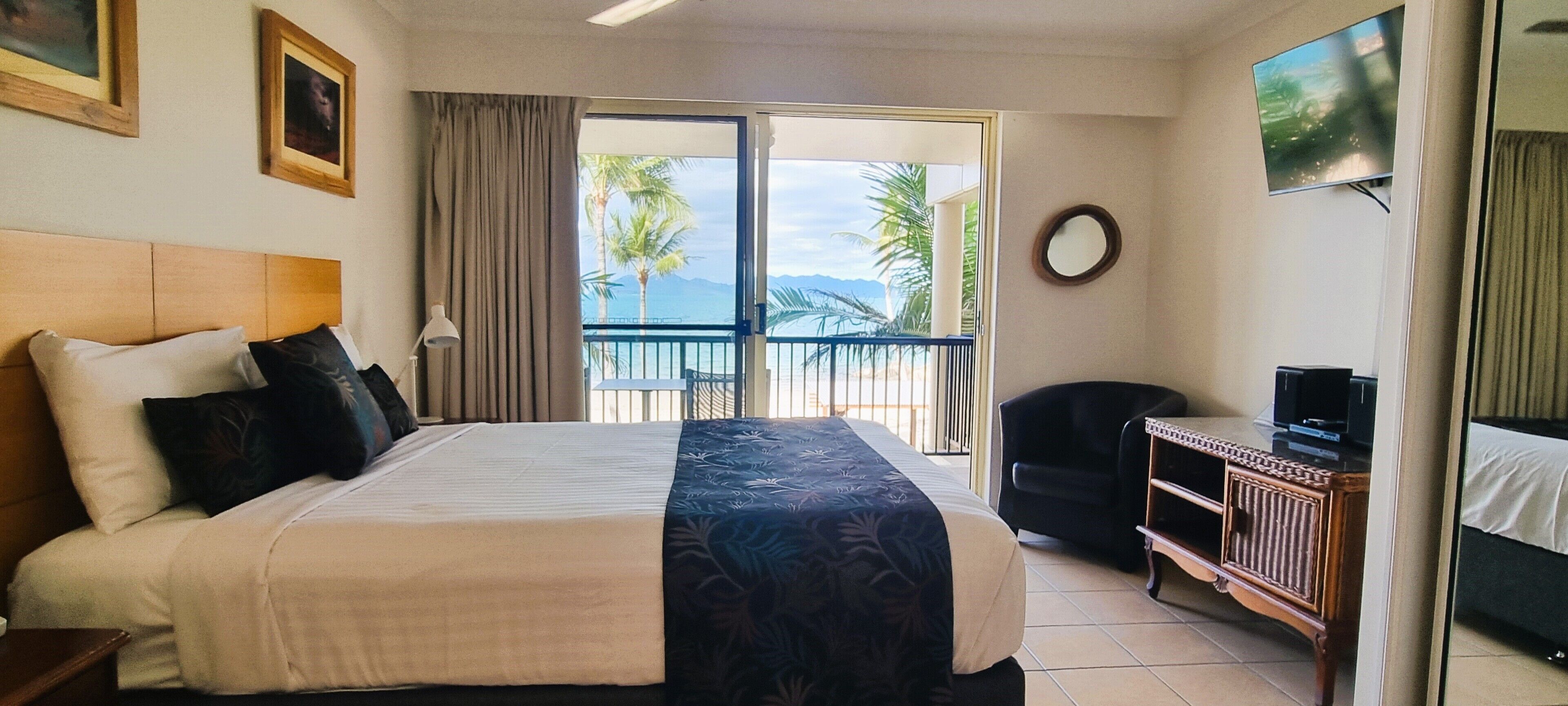 Premium Studio, 1 Queen Bed, Beach View | Pillowtop beds, individually decorated, individually furnished, desk