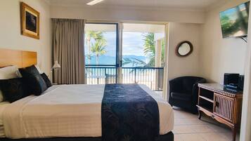 Premium Studio, 1 Queen Bed, Beach View | Pillowtop beds, individually decorated, individually furnished, desk