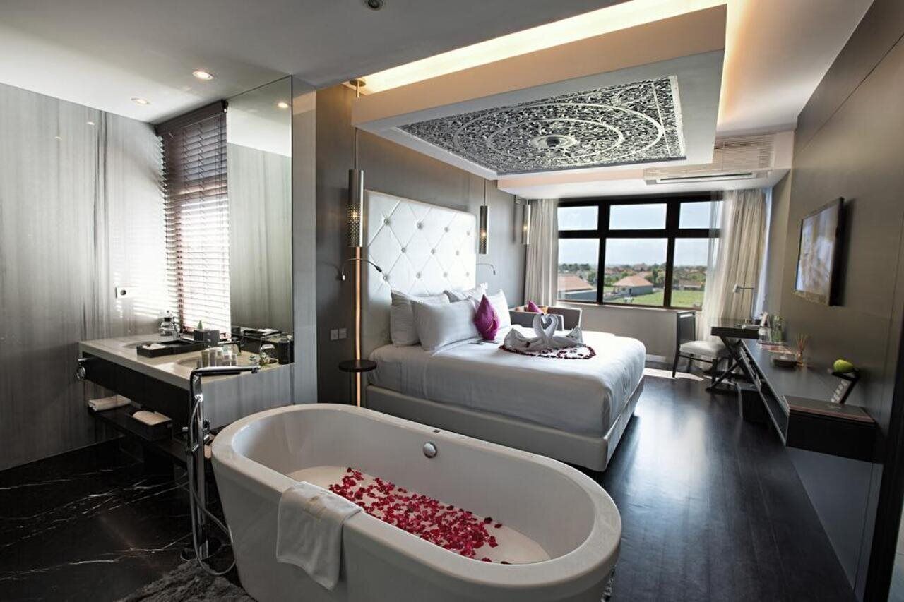 designer toiletries, hair dryer, bathrobes, slippers