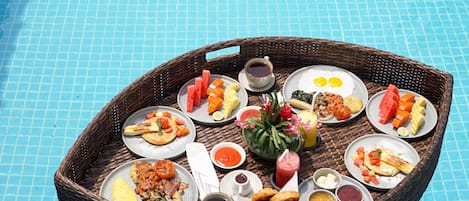 Outdoor pool, open 7:00 AM to 9:00 PM, pool umbrellas, sun loungers