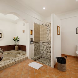 Suite | Badkamer | Gratis toiletartikelen, een haardroger, handdoeken, zeep