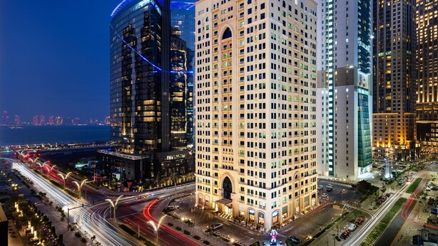 A high-rise hotel with a classic architectural style, featuring a central courtyard and multiple floors. - Marriott Executive Apartments City Center Doha (Doha)