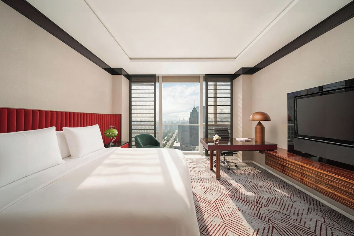 Ropa de cama de alta calidad, cubrecamas y minibar