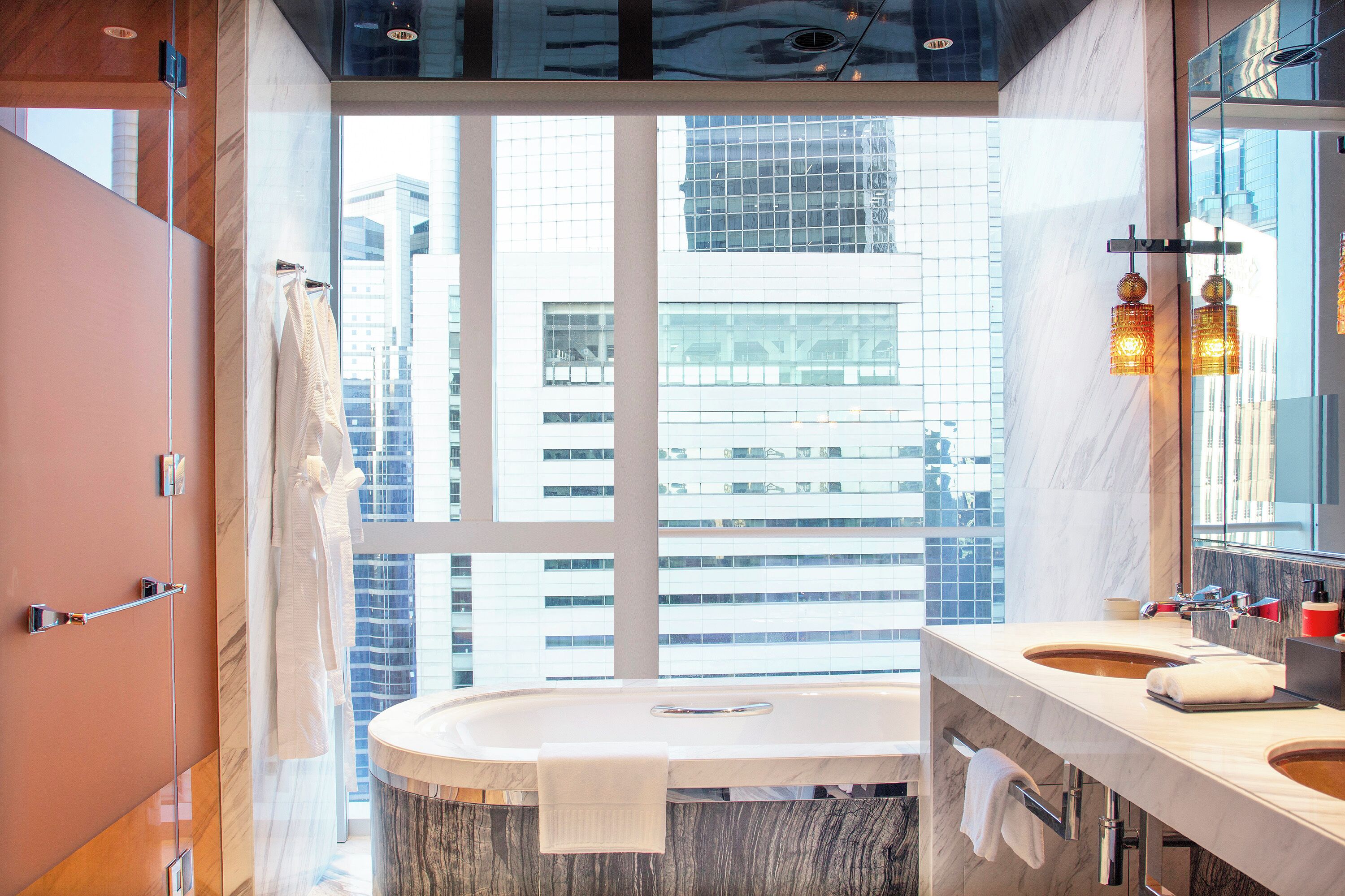 combined shower/bathtub, deep-soaking bathtub, rainfall showerhead