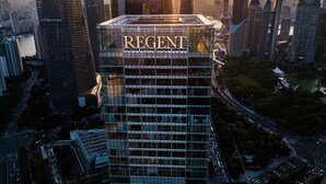 A high-rise building with the name "REGENT" prominently displayed on its facade. - Regent Shanghai Pudong (Shanghai)