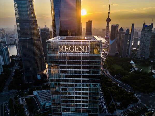 A high-rise building with the name "REGENT" prominently displayed on its facade. - Regent Shanghai Pudong (Shanghai)