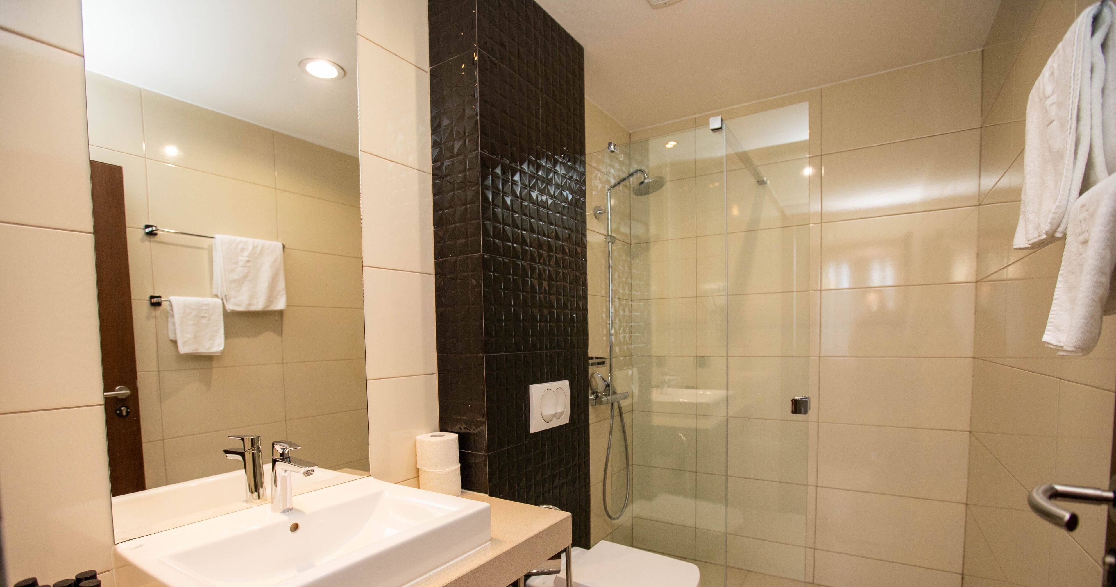 junior suite, 1 bedroom, city view | bathroom | hair dryer, towels