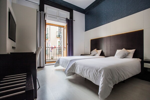 Superior Double Room | Minibar, in-room safe, desk, blackout drapes