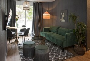 Apartment, 1 Bedroom | Living room | 43-inch flat-screen TV with digital channels, TV