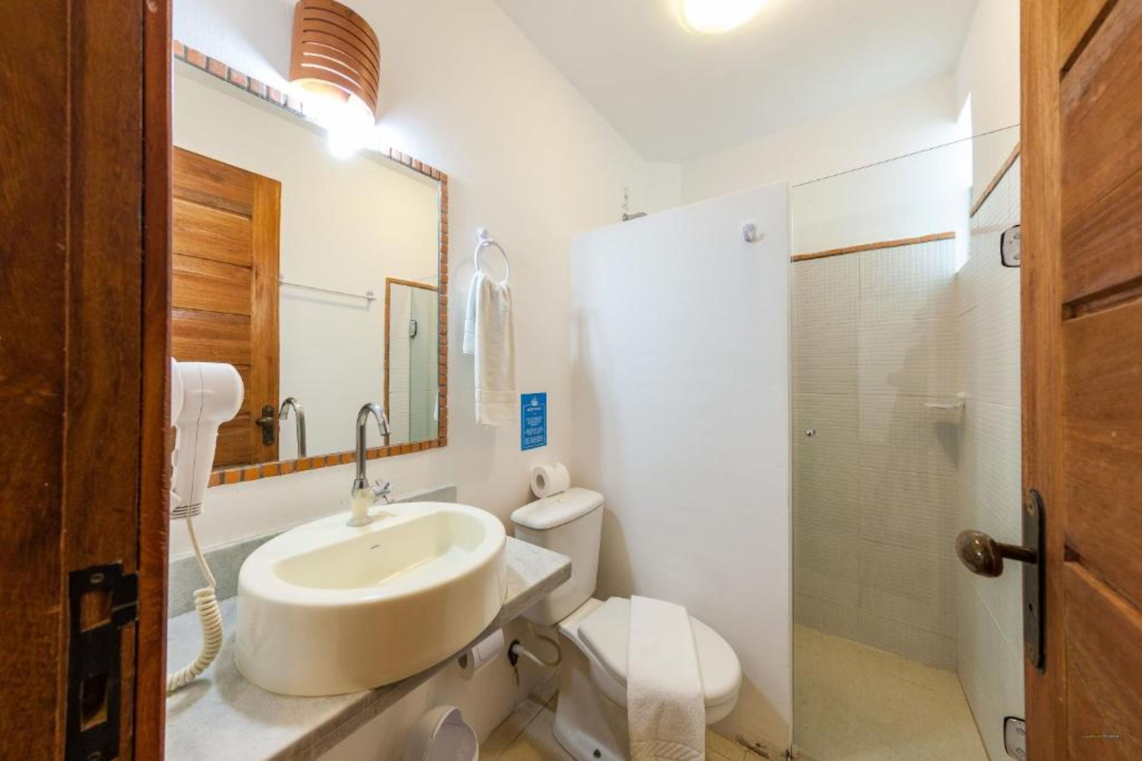 economy triple room | bathroom | shower, hair dryer, towels