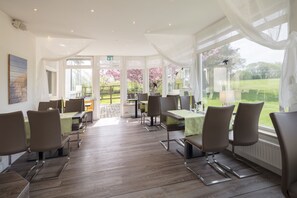 Breakfast, dinner served; international cuisine, al fresco dining