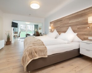 Hypo-allergenic bedding, down duvets, in-room safe