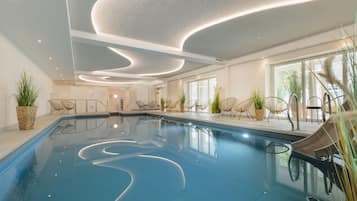 Indoor pool, open 6:00 AM to 9:00 PM, pool loungers