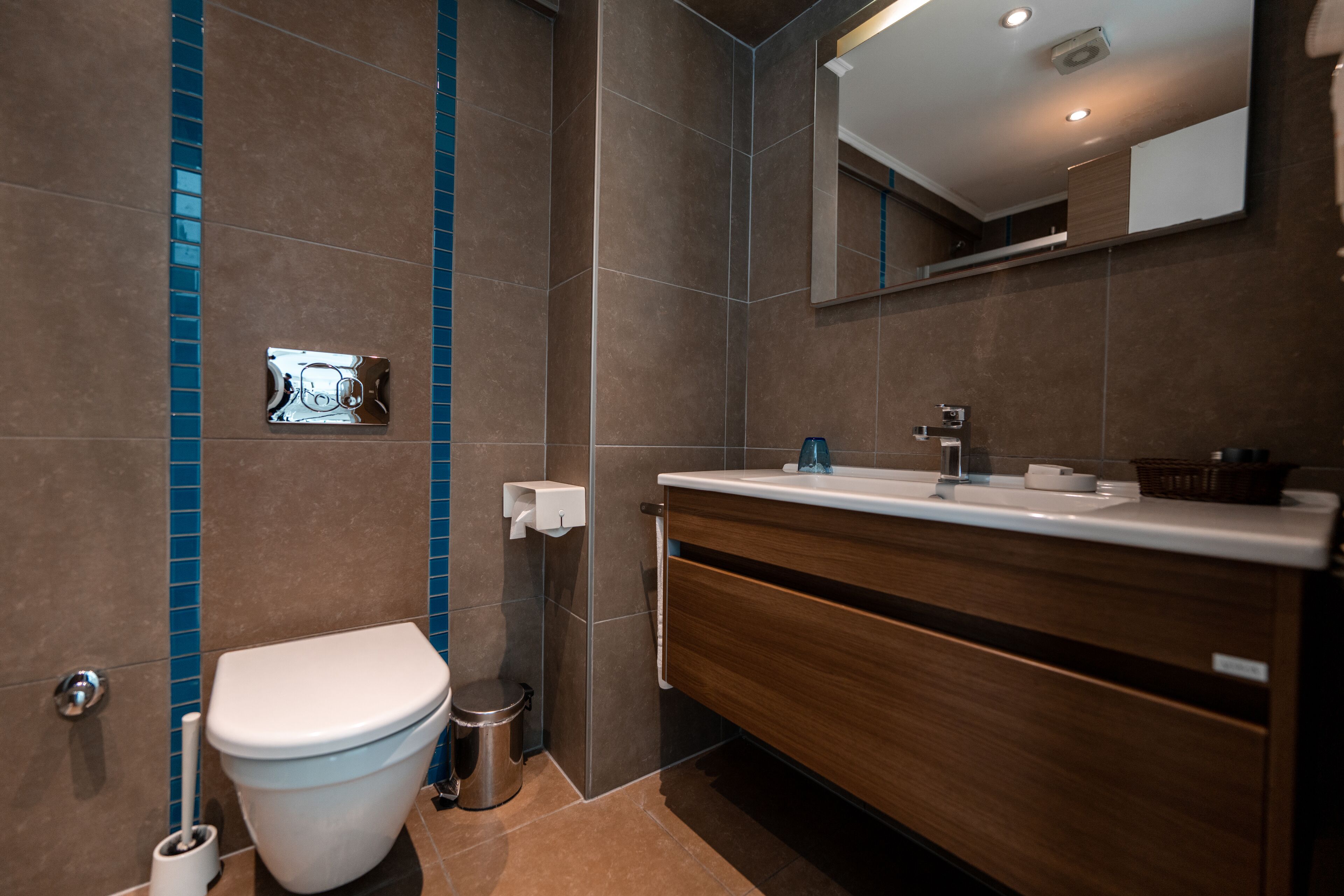 shower, hair dryer, bathrobes, slippers