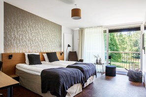 Habitación Business con 1 cama doble o 2 individuales | Ropa de cama hipoalergénica y escritorio