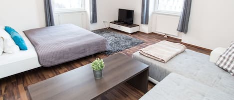 Quarto superior, várias camas | Ferros/tábuas de passar roupa, berços grátis, Wi-Fi de cortesia
