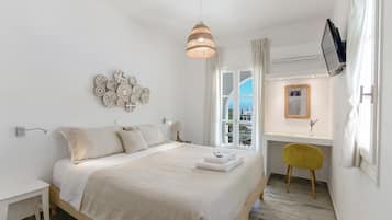 Standard Room, 1 Double or 2 Single Beds, Balcony, Partial Sea View | Egyptian cotton sheets, premium bedding, down duvets, in-room safe