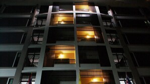 A multi-story building with a sign reading "Pattara Place" at the entrance. - Pattara Place (Chiang Mai)