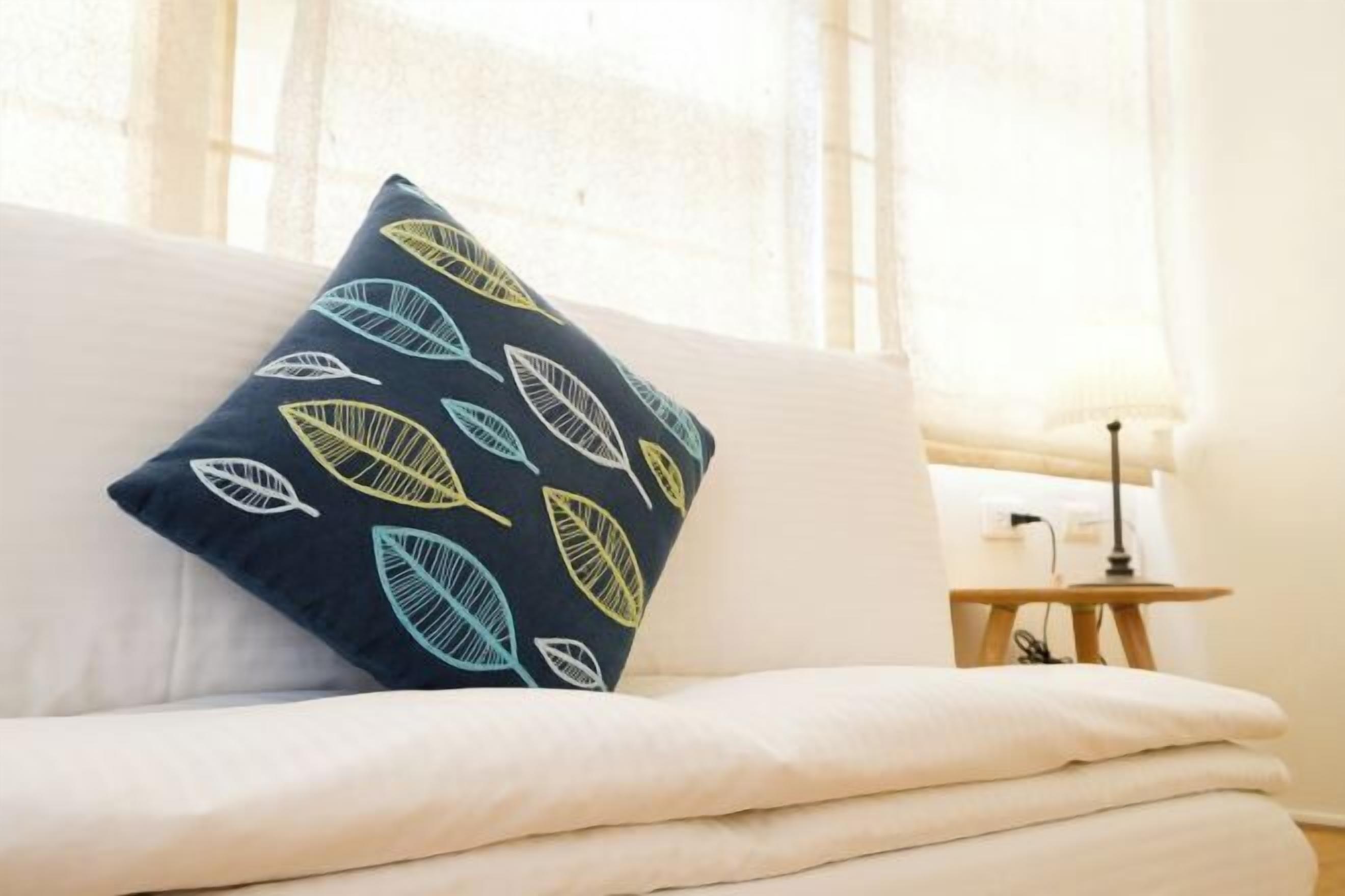 Premium bedding, down comforters, individually decorated