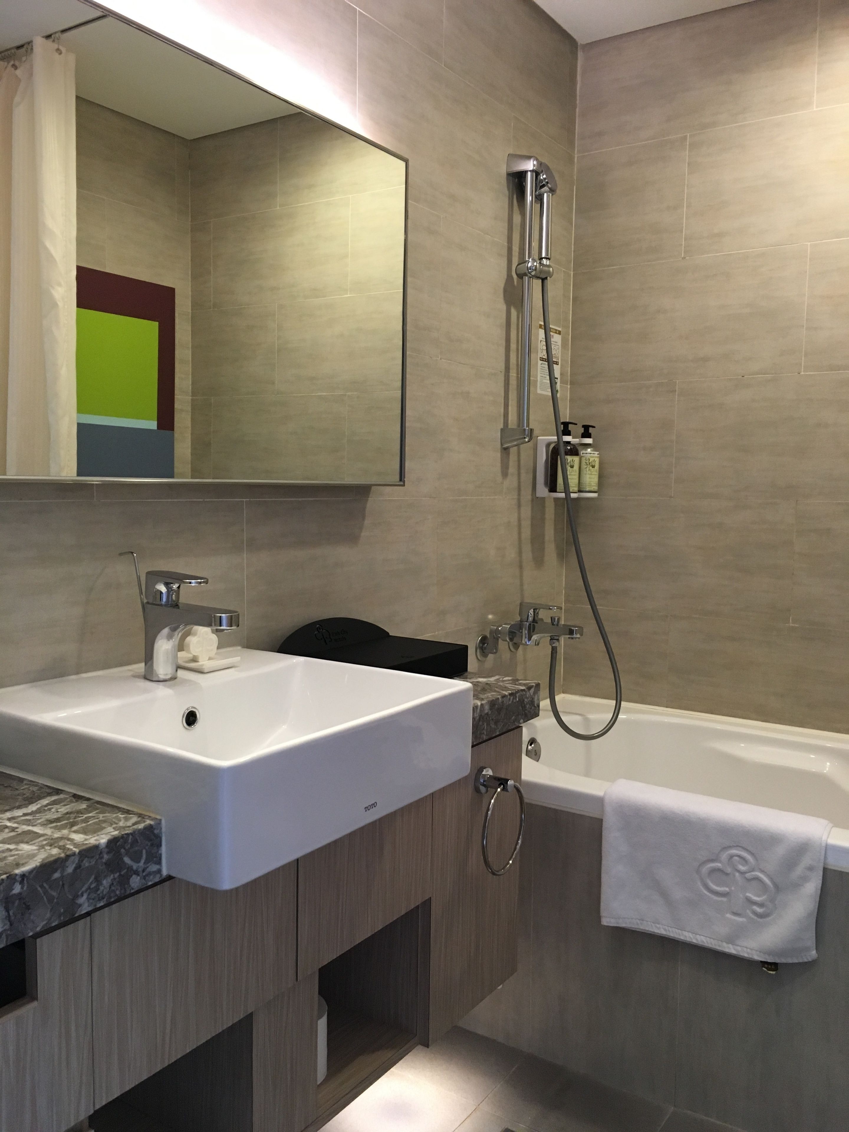 free toiletries, hair dryer, slippers, towels